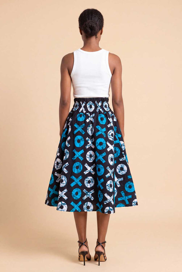 Jupe wax africaine Saida motif ronds et croix bleu blanc et noir taille haute smockée
