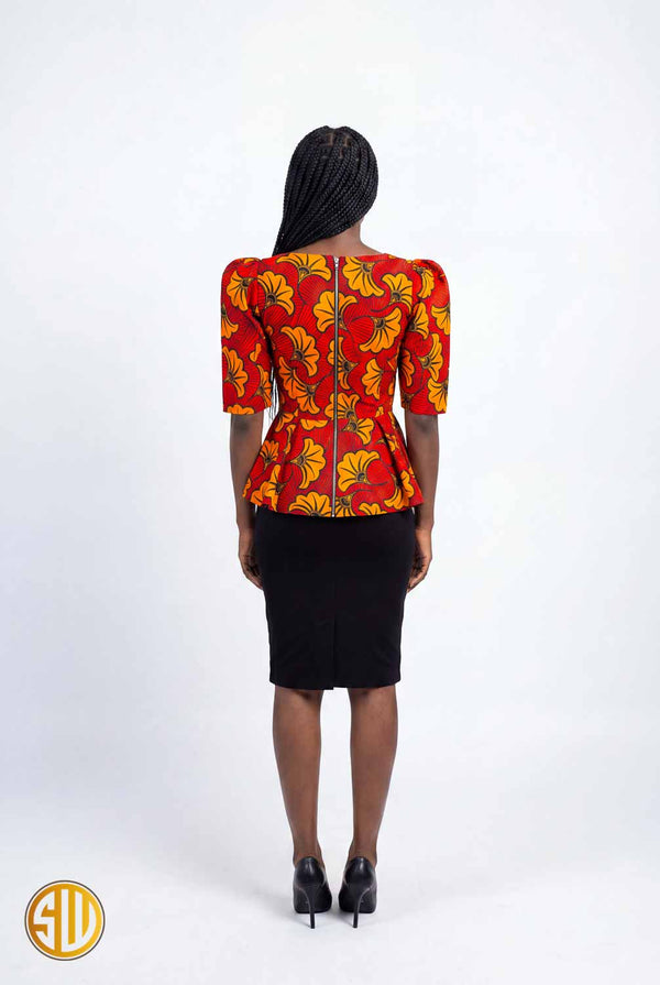 Top africain en wax rouge et orange – coupe peplum élégante