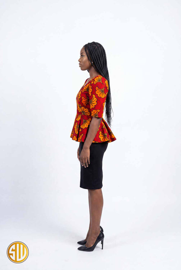 Top africain en wax rouge et orange – coupe peplum élégante