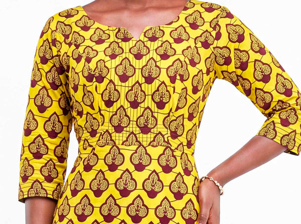 Robe africaine en wax jaune – coupe sirène élégante et moderne