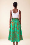 Jupe wax africaine Fanta motif géométrique vert et orange taille haute smockée