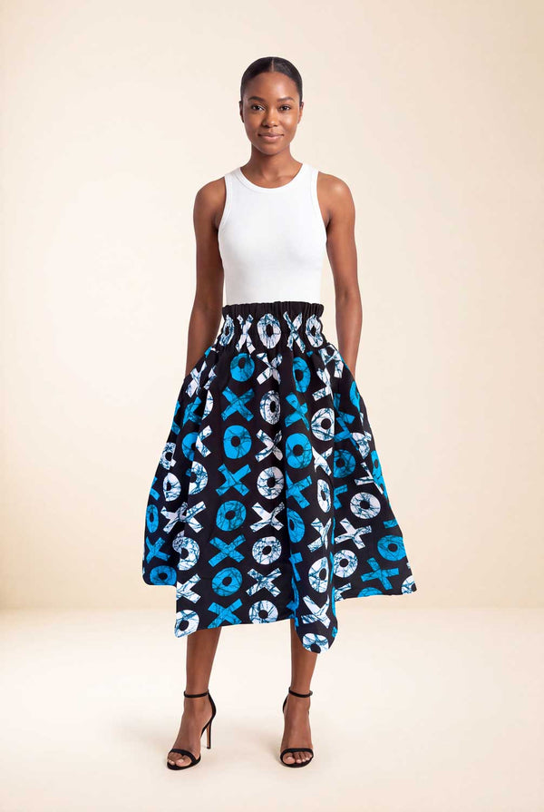 Jupe wax africaine Saida motif ronds et croix bleu blanc et noir taille haute smockée